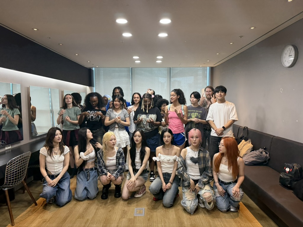 Students learning Kpop tiktok trend from kpop girl group