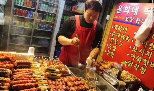 Food vendor giving food