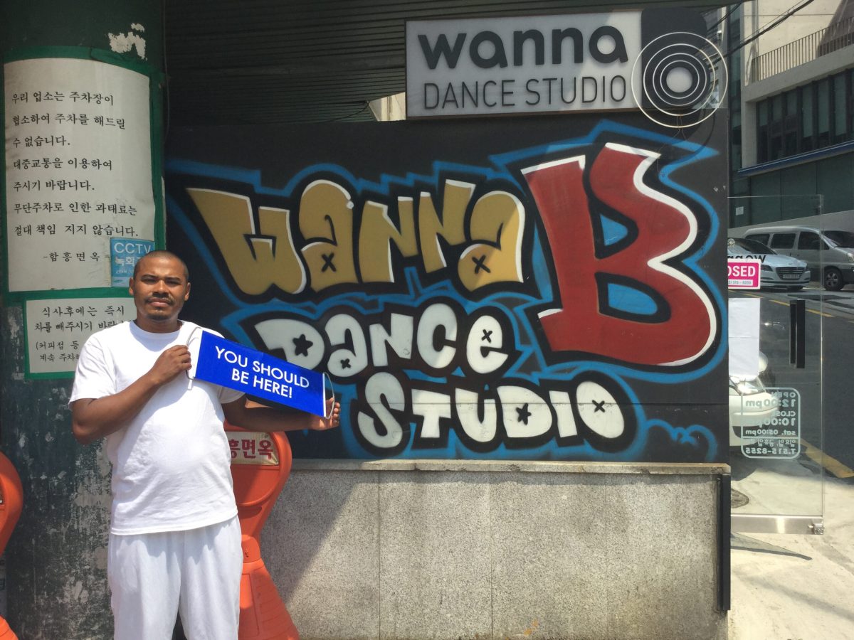 Student standing a front of a dance studio