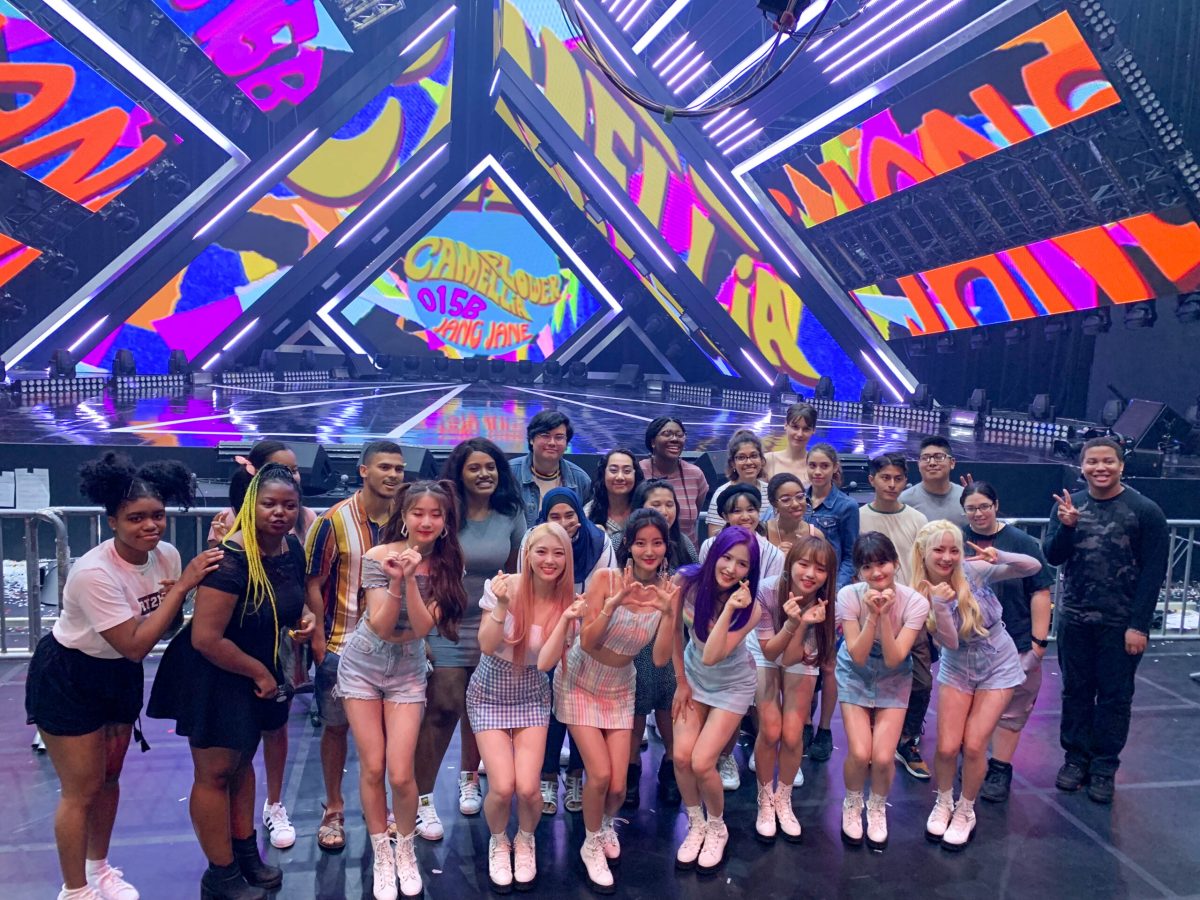 Students posing with Kpop group at Music Core
