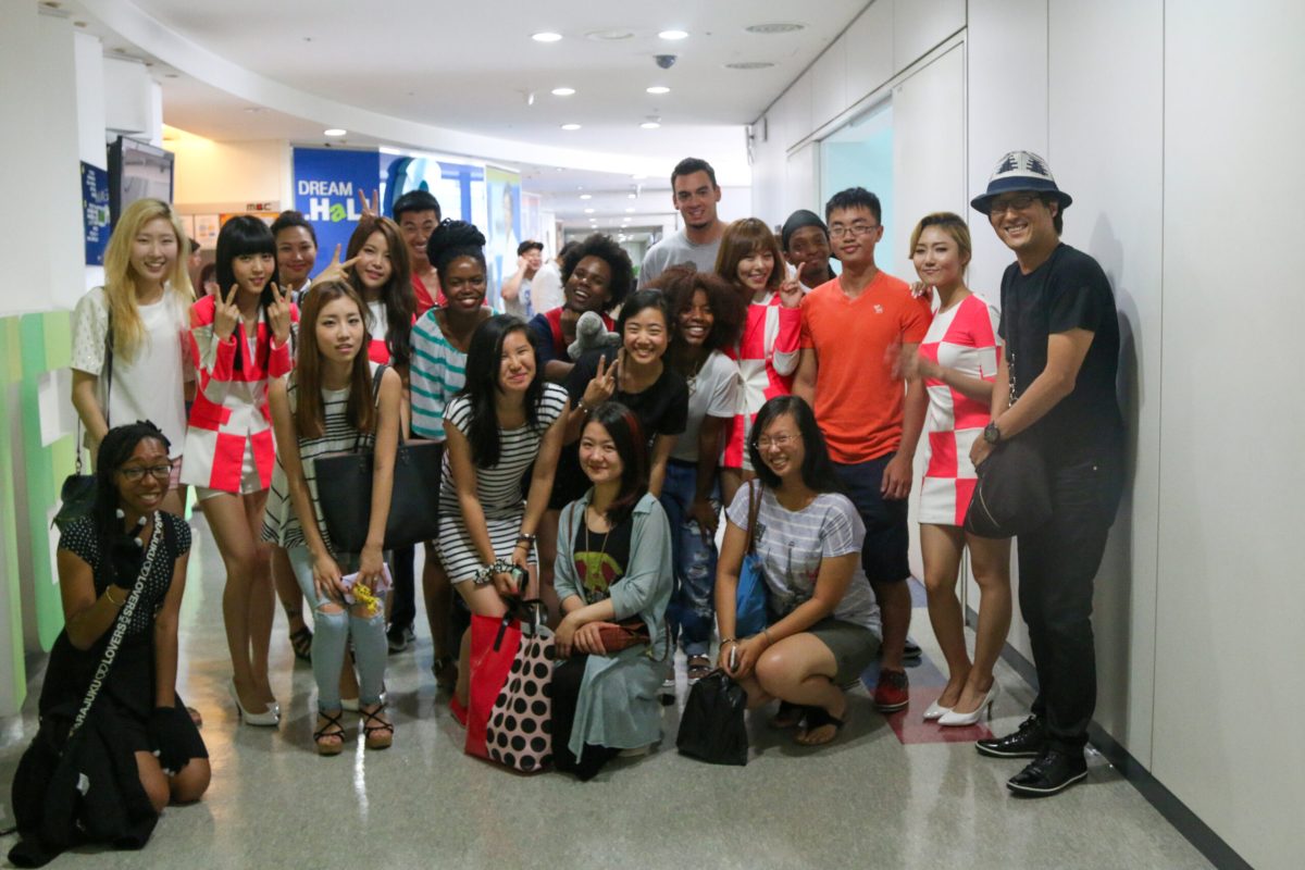 Students takin a picture with a Kpop girl group